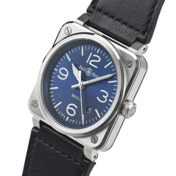 Left-side profile of the Bell & Ross BR 03 Blue Steel watch, showcasing its angular stainless steel case with brushed blue finish, screw-down crown with Bell & Ross logo, and integrated lugs for the blue calfskin leather strap.