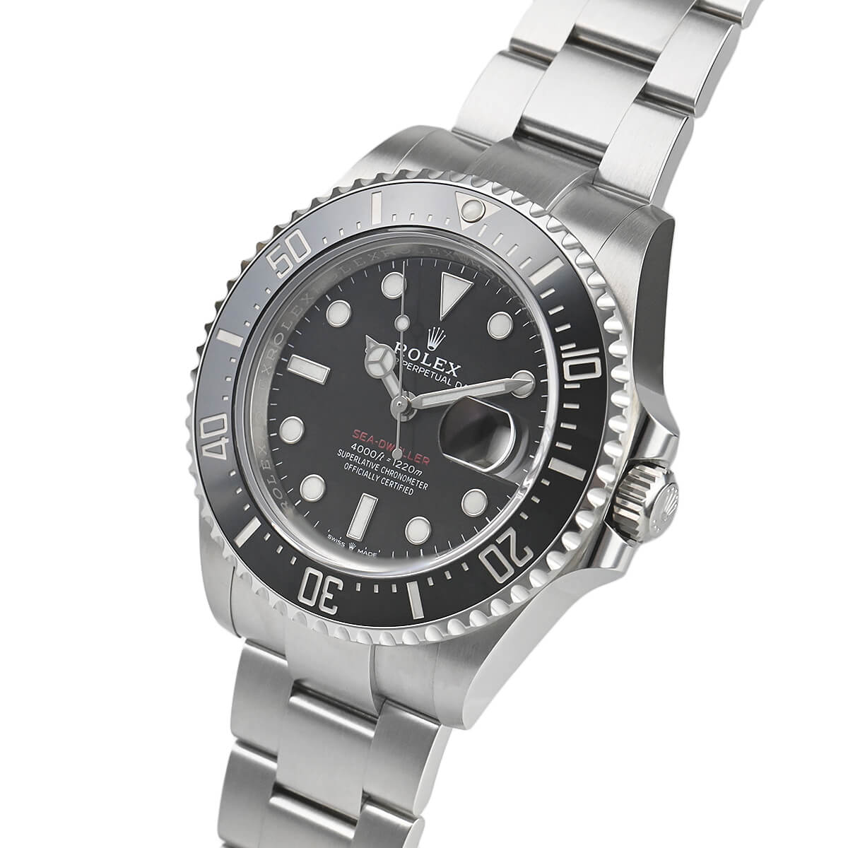 A side profile of the Rolex Sea-Dweller 126600-0001 showing the polished stainless steel case, Triplock crown with Rolex coronet, and the fluted crown guards for enhanced water resistance up to 1,220 meters (4,000 feet).