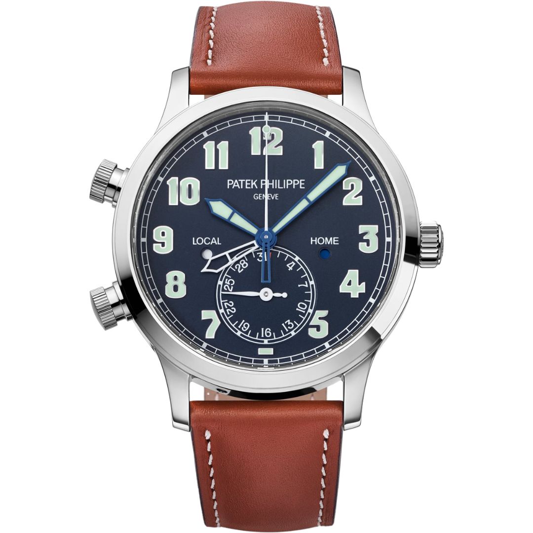 Patek Philippe Calatrava Pilot Travel Time 42mm 5524G-001 with blue dial and brown leather strap.