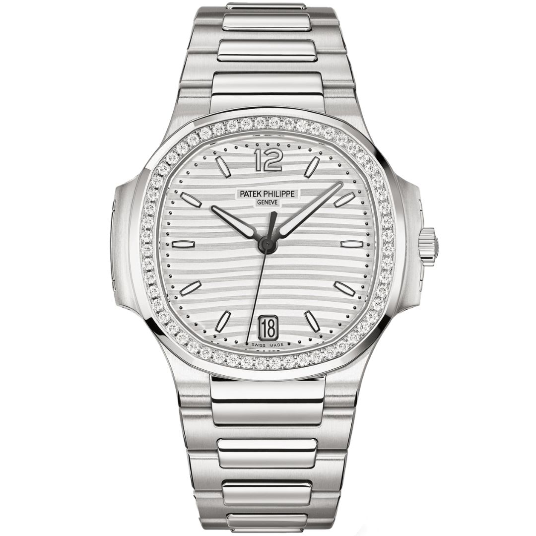 Patek Philippe Nautilus 7118/1200A-010 luxury watch with 35.2mm stainless steel case, diamond-set bezel, and white opaline dial. Features white gold luminous hands, hour markers, and date window at 6 o’clock. Includes stainless steel bracelet with folding clasp, powered by automatic Caliber 324 S C movement.
